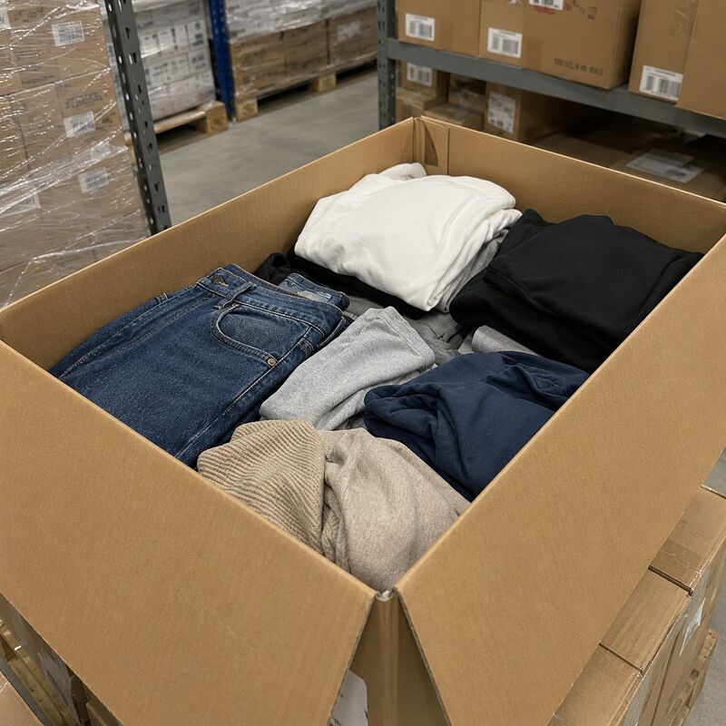 Folded branded clothing in a box